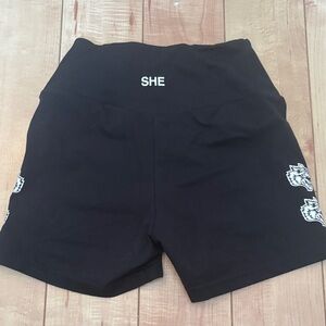 Darc Sport Black High-Waist Bike Shorts with White 'SHE' Logo